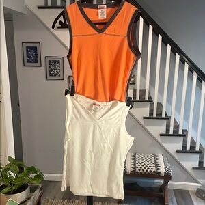 ⭐️ 5 items for $15 ⭐️NWOT Danskin Orange and Black Ladies Top